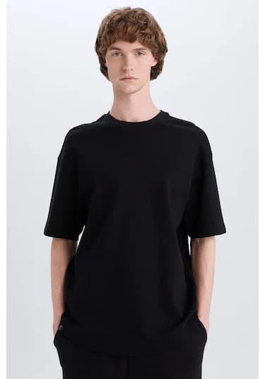 DeFacto Boxy Fit Bisiklet Yaka Kısa Kollu Basic Düz Waffle Siyah Tişört B4443AX24AUBK81